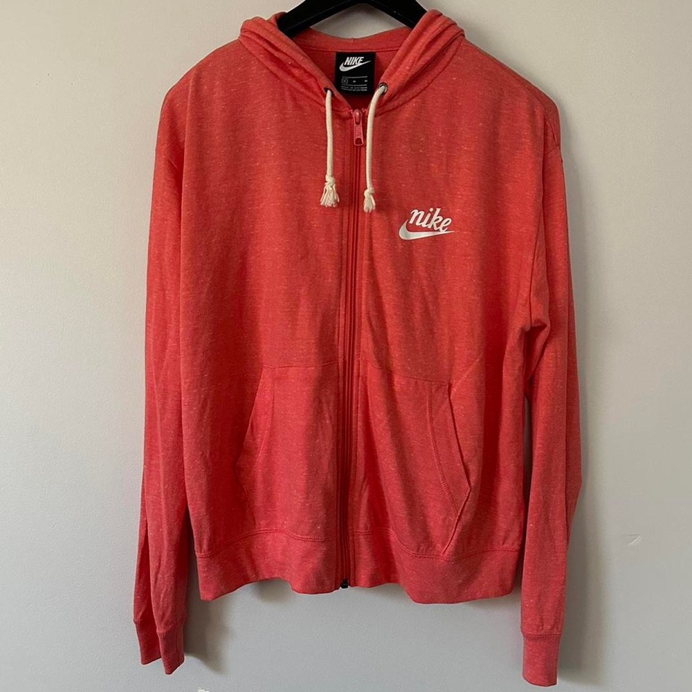 m nike sportswear hoodie
on the thin side; loose fitting
peachy orange